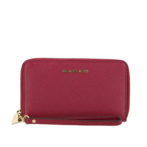 michael kors ipad wallet|Michael Kors dark cherry wallet.